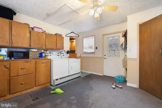 a front view of a house with garage