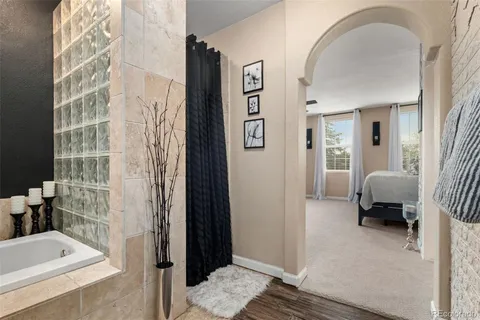 a bathroom with a sink a vanity and a mirror