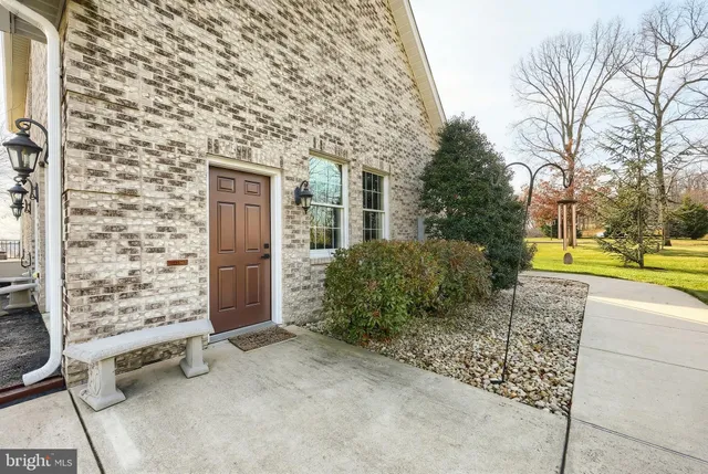 a view of a pathway with a yard