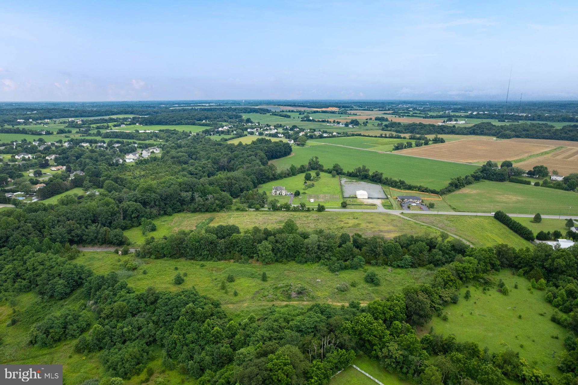 555 Woodstown Road Swedesboro, NJ 08085 - Photo 11 of 19 an aerial view of residential houses with outdoor space and trees