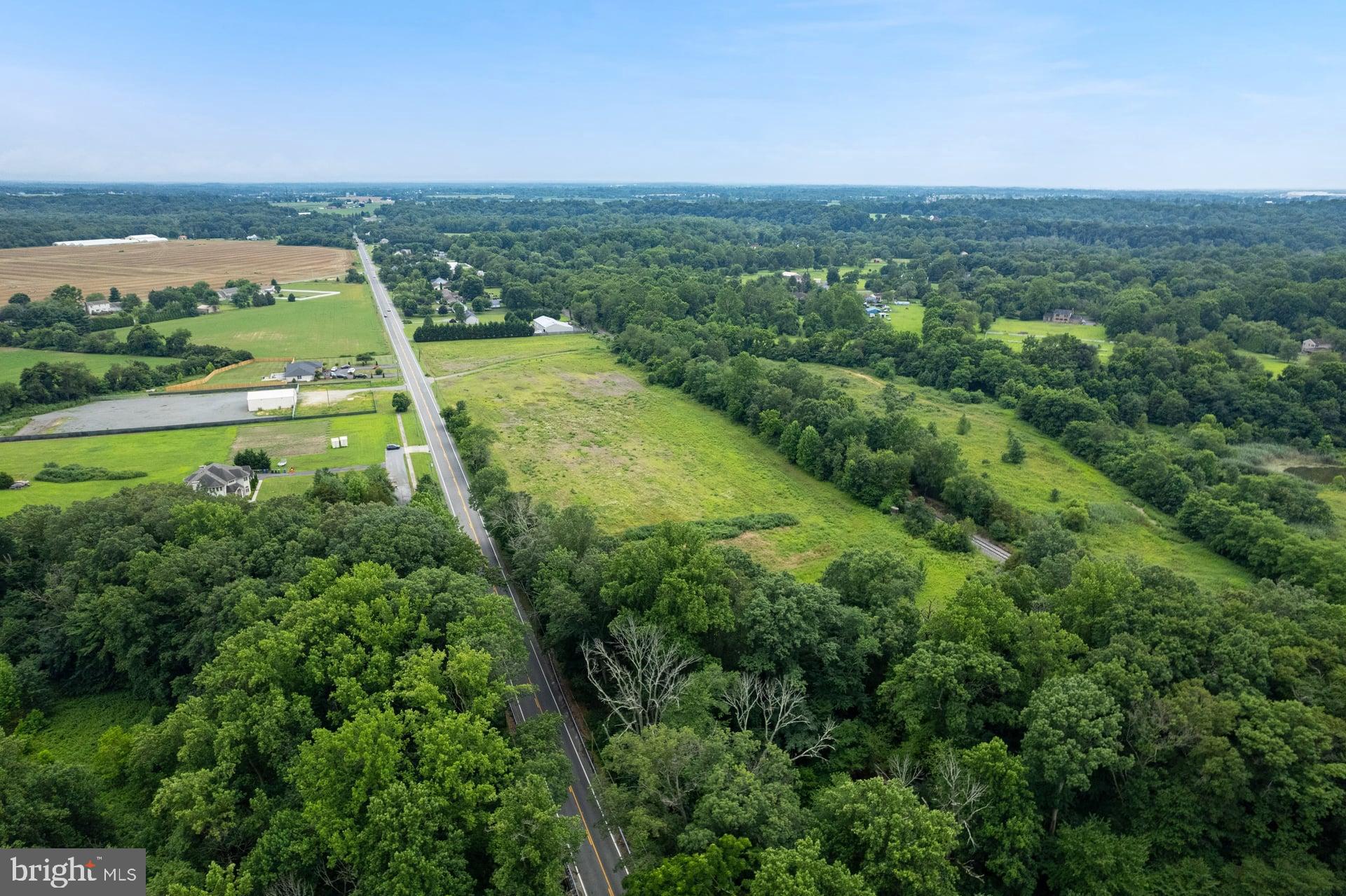 555 Woodstown Road Swedesboro, NJ 08085 - Photo 15 of 19 an aerial view of huge green field with lots of green space