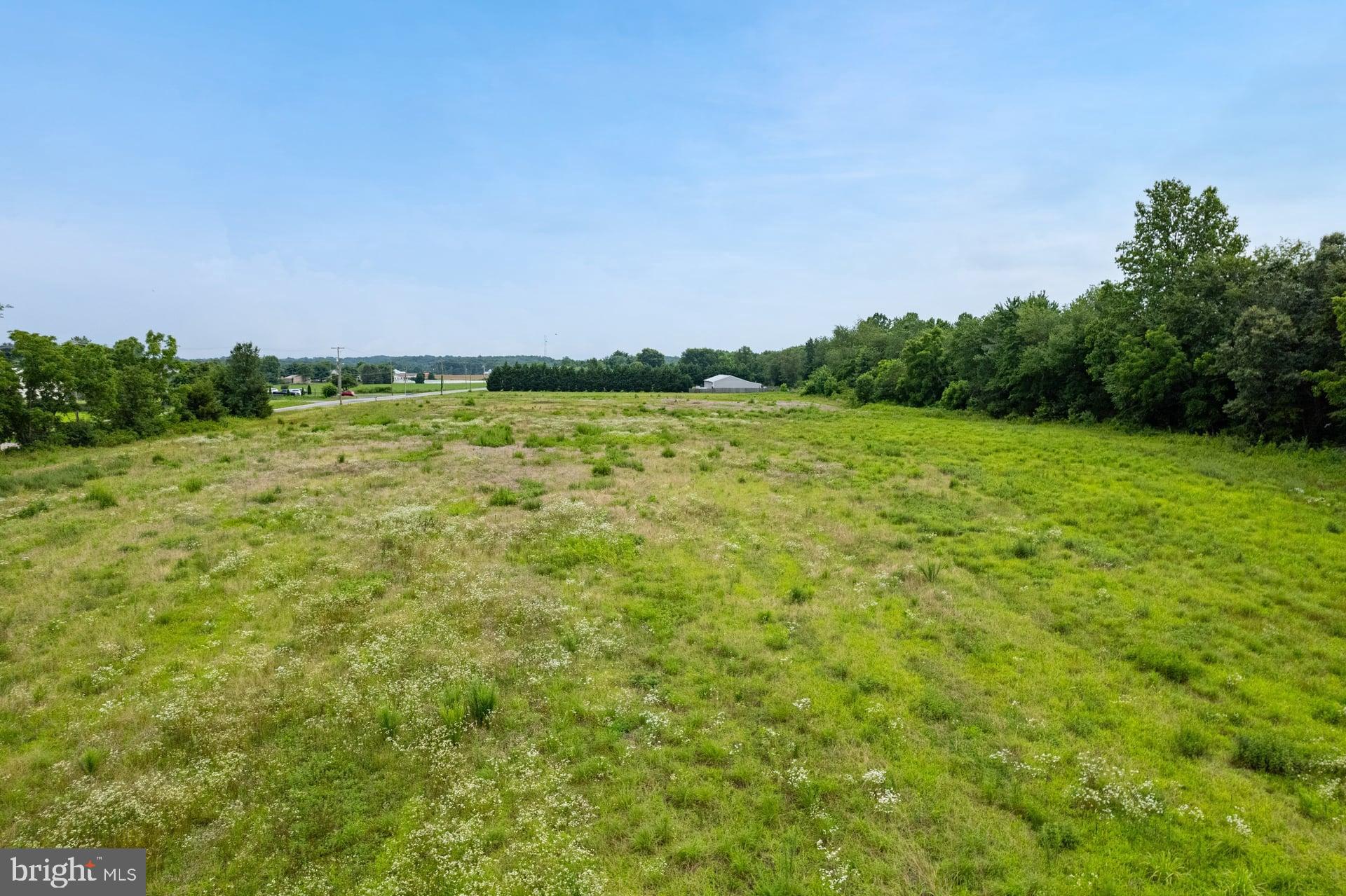555 Woodstown Road Swedesboro, NJ 08085 - Photo 18 of 19 a view of a green field with clear sky
