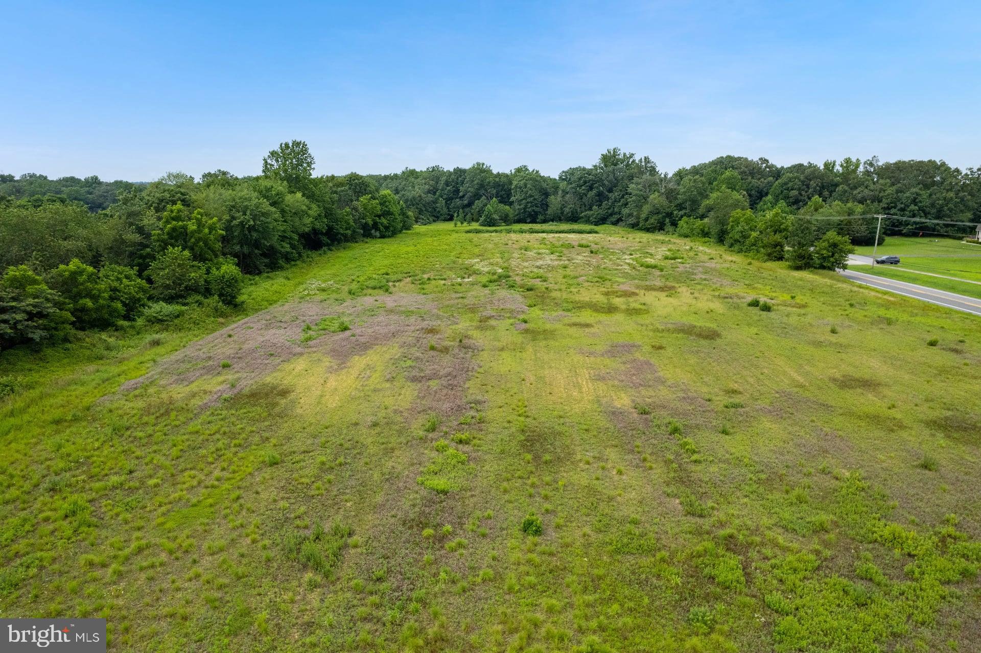 555 Woodstown Road Swedesboro, NJ 08085 - Photo 19 of 19 a view of a field with an ocean view