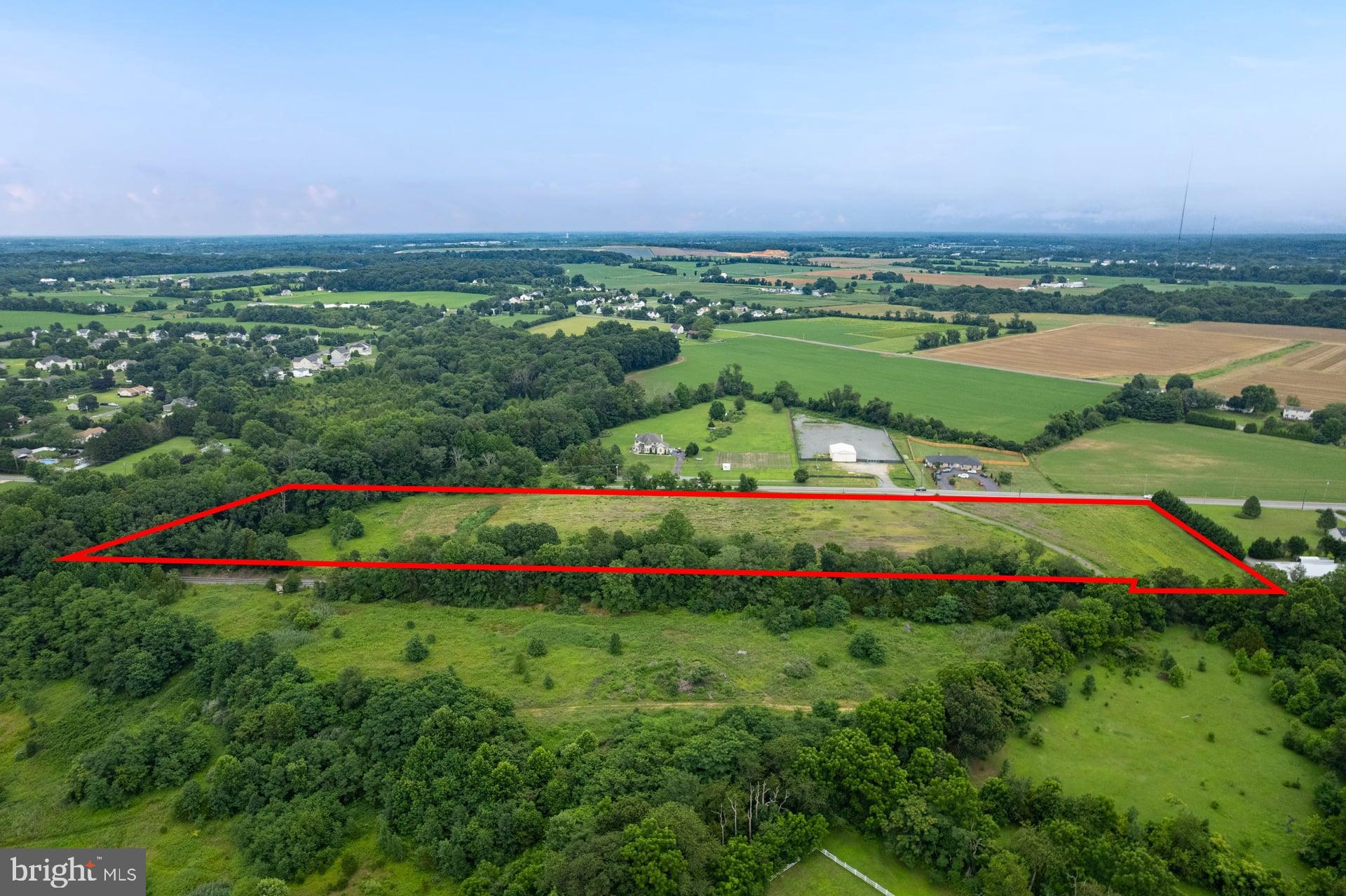 555 Woodstown Road Swedesboro, NJ 08085 - Photo 10 of 19 a view of a city with lush green space