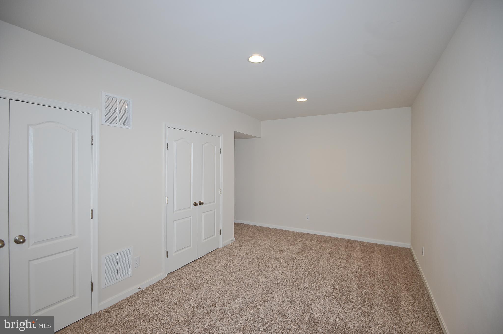9038 Sudley Road, Unit 15A Manassas, VA 20110 - Photo 26 of 29 Basement Game Room