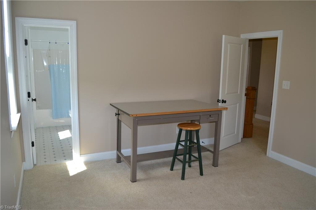 1484 Smothers Road Madison, NC 27025 - Photo 25 of 30 Second floor guest bedroom with private three piece bathroom and spacious walk in closet.