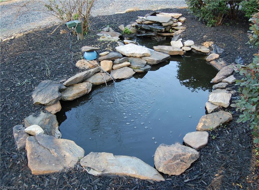 1484 Smothers Road Madison, NC 27025 - Photo 30 of 30 Koi pond located in front island.