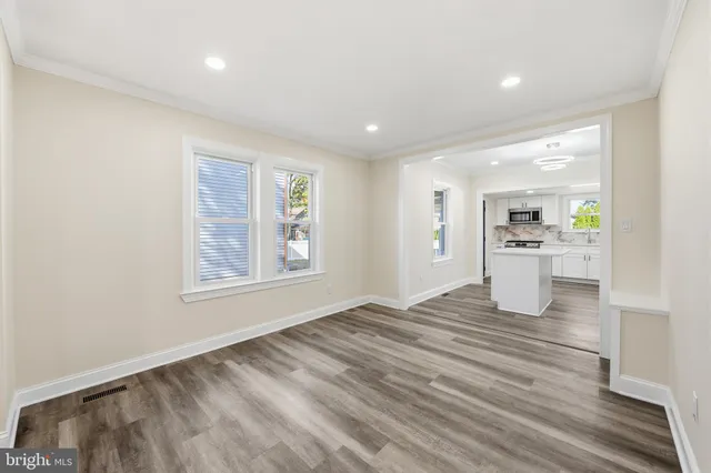 a view of an empty room and window