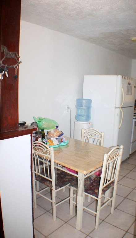 3827 Landa Lane Houston, TX 77023 - Photo 8 of 23 a view of a dining room with furniture and a table