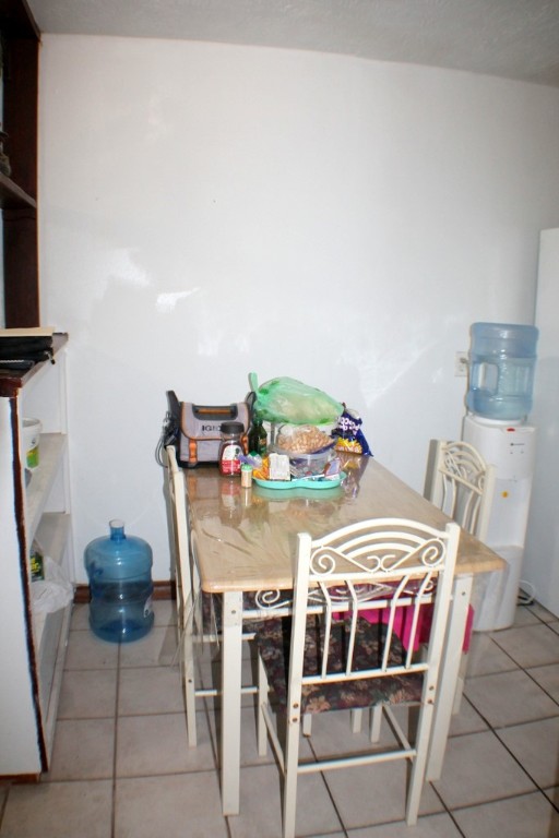 3827 Landa Lane Houston, TX 77023 - Photo 9 of 23 a view of a dining room with furniture and wooden floor