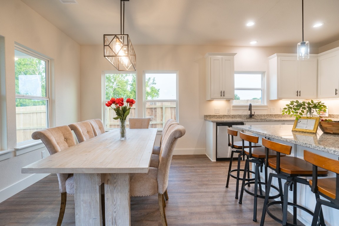 304 String Prairie Way Smithville, TX 78957 - Photo 10 of 30 Dining room with dark wood-style floors, recessed lighting, and baseboards