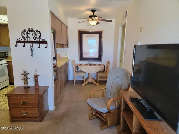 a living room with furniture and a window