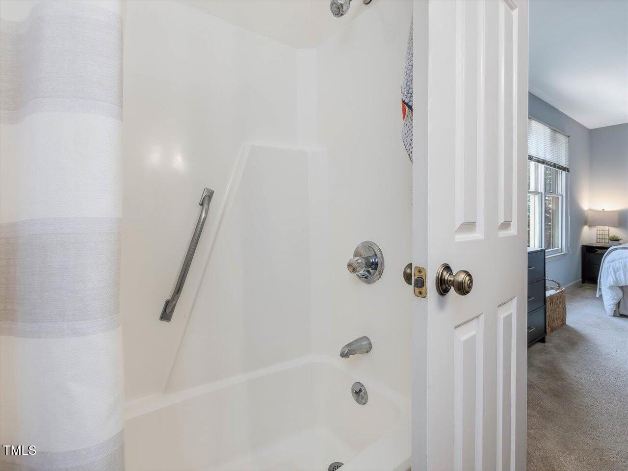 1328 Baez Street Raleigh, NC 27608 - Photo 20 of 32 a bathroom with a bathtub