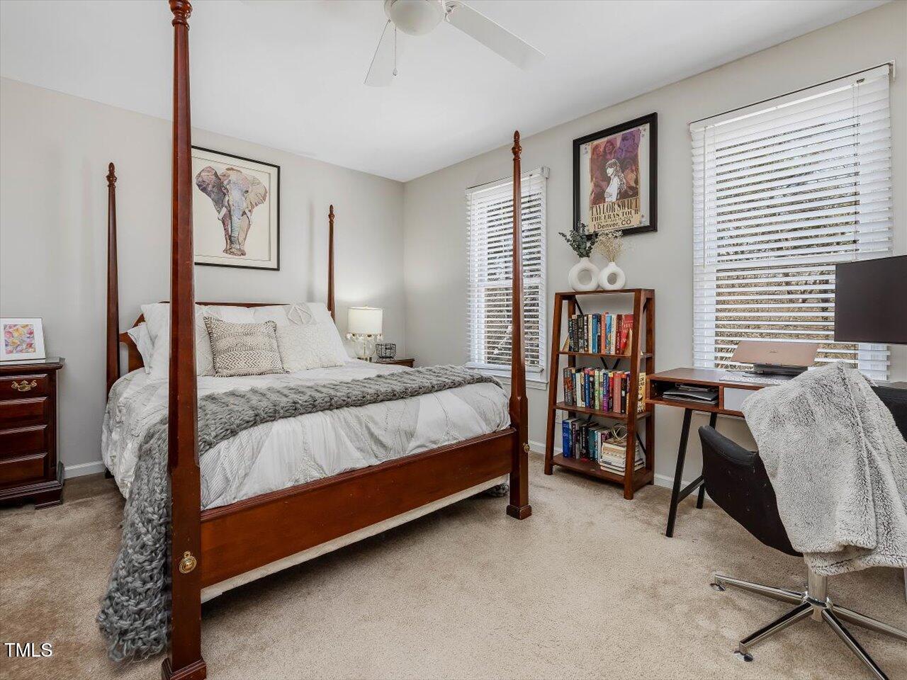 1328 Baez Street Raleigh, NC 27608 - Photo 21 of 32 a bedroom with a bed chair and a desk