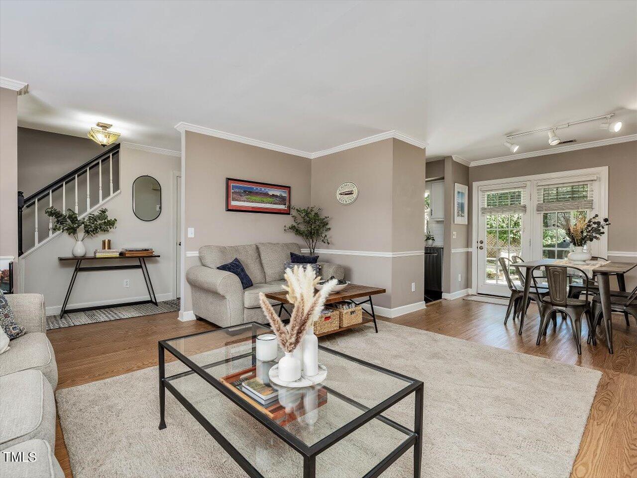 1328 Baez Street Raleigh, NC 27608 - Photo 7 of 32 a living room with furniture a table and chairs