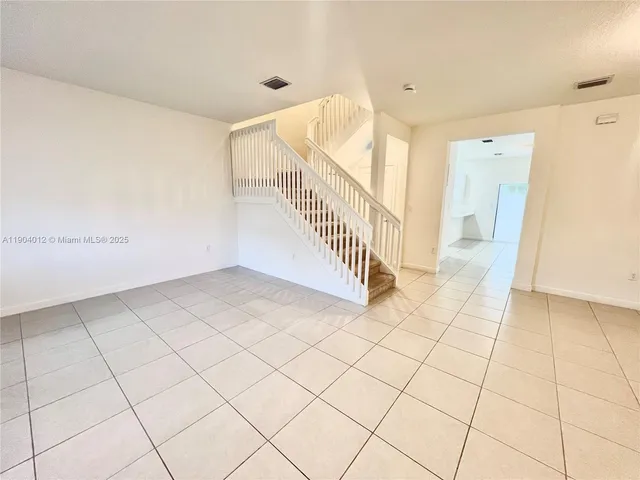 a view of an entryway with stairs