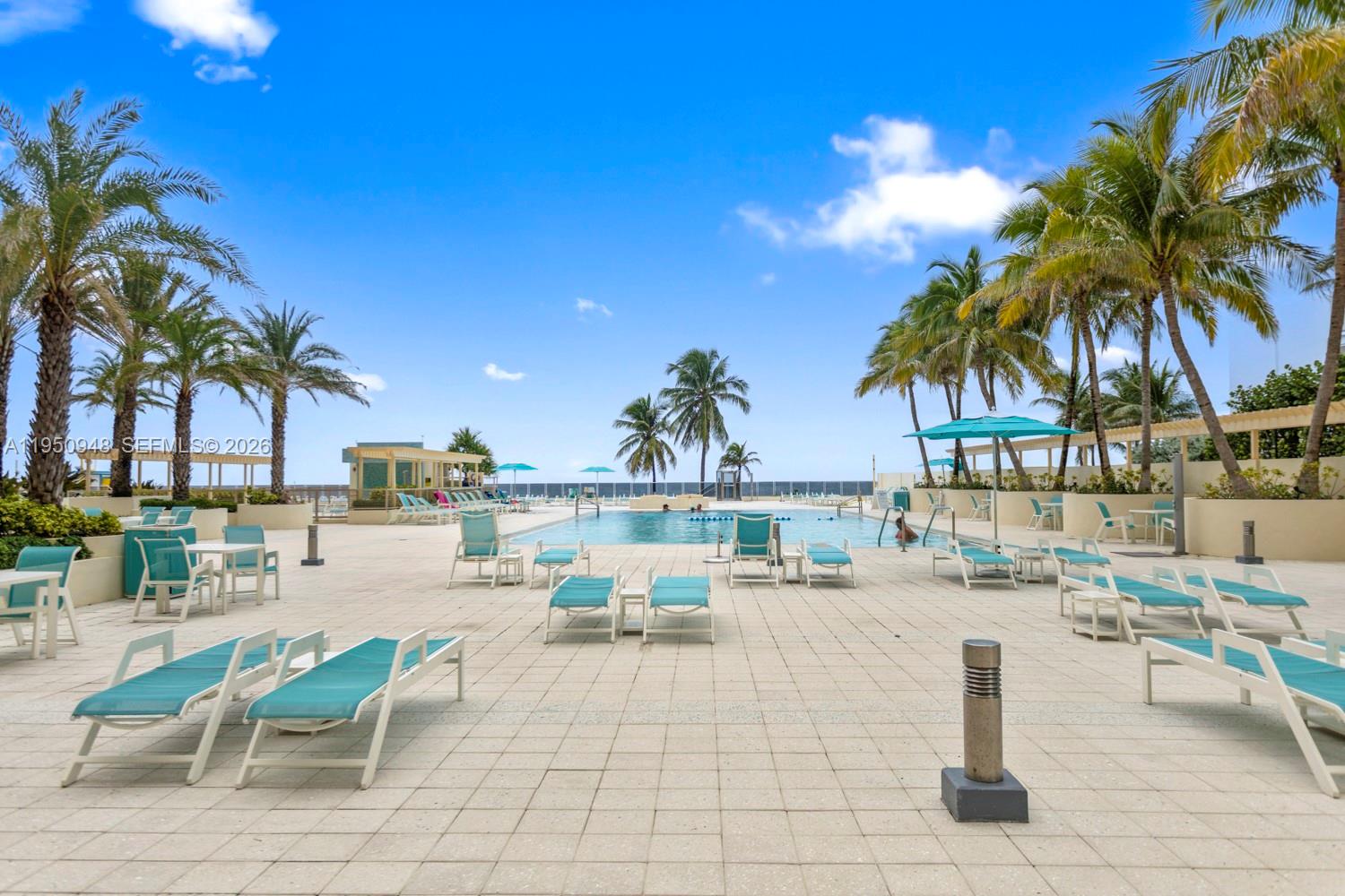 2501 South Ocean Drive, Unit 1105 Hollywood, FL 33019 - Photo 26 of 45 a view of a swimming pool with outdoor seating