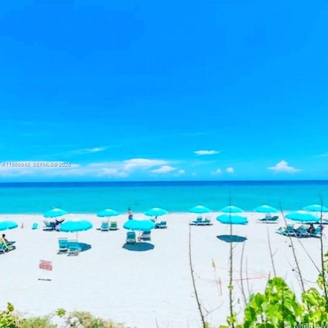 2501 South Ocean Drive, Unit 1105 Hollywood, FL 33019 - Photo 43 of 45 a view of a chairs and table in a backyard