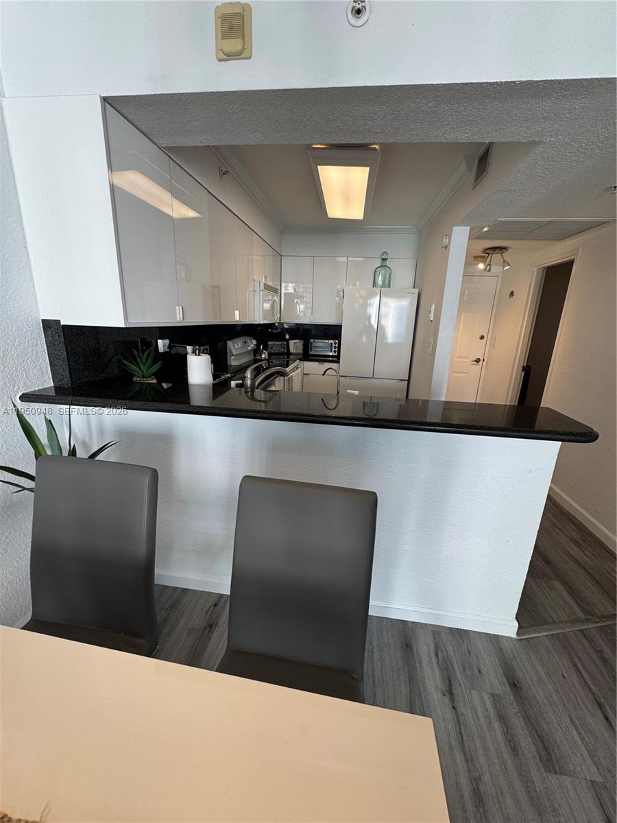 2501 South Ocean Drive, Unit 1105 Hollywood, FL 33019 - Photo 5 of 45 a living room with wooden floor