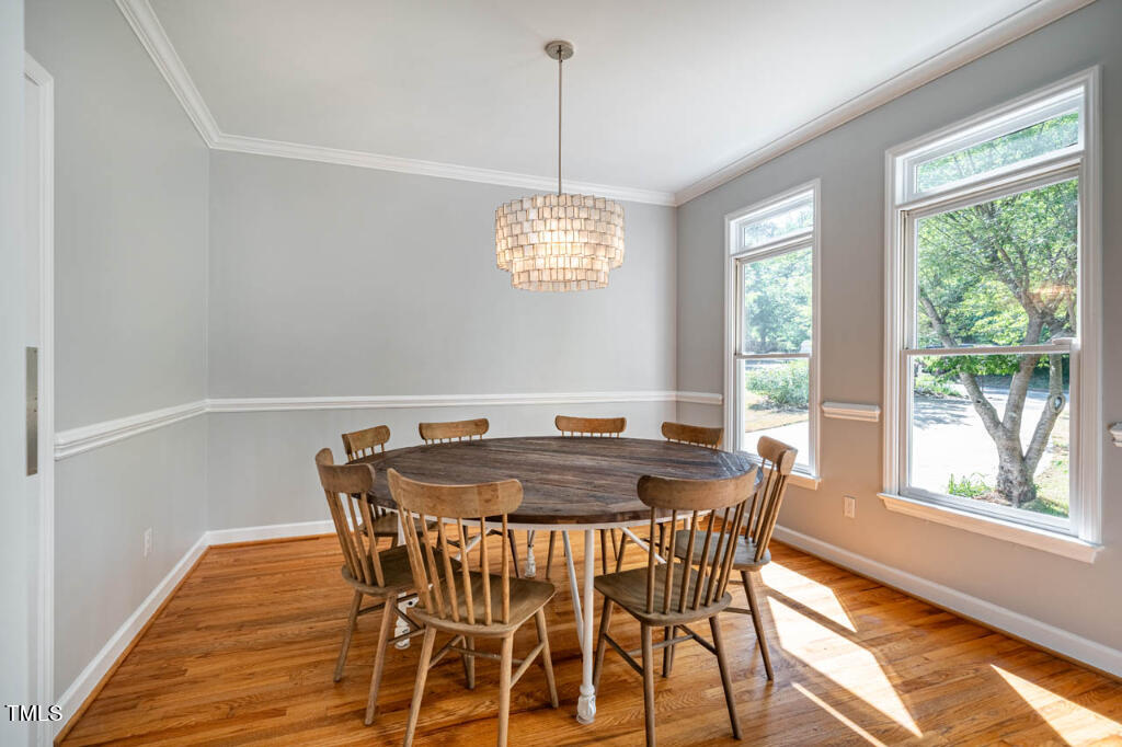 608 Manor Ridge Road Carrboro, NC 27510 - Photo 31 of 70 a view of a dining room with furniture window and outside view