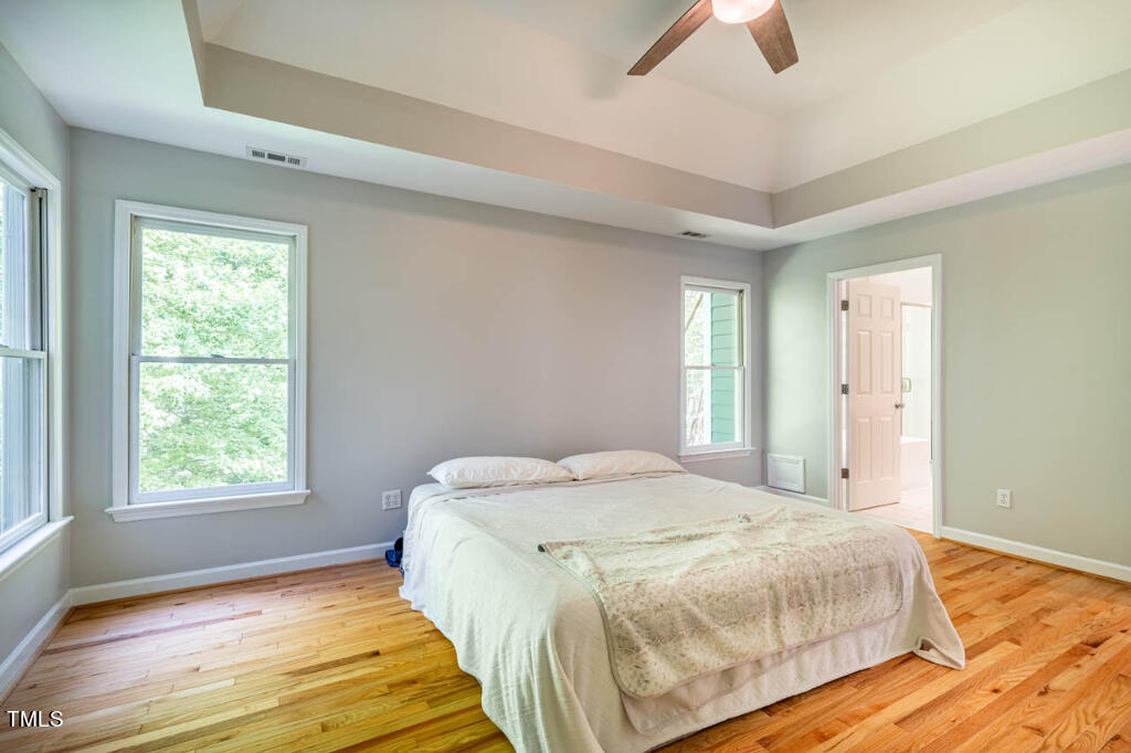 608 Manor Ridge Road Carrboro, NC 27510 - Photo 54 of 70 a bedroom with a bed and a window