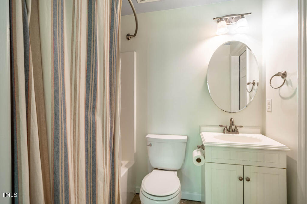 608 Manor Ridge Road Carrboro, NC 27510 - Photo 68 of 70 a bathroom with a toilet sink and mirror