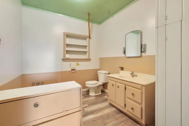 an aerial view of a houses with a yard