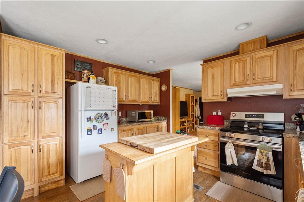 534 Finks Run Road McDonald, PA 15057 - Photo 29 of 35 a kitchen with stainless steel appliances a stove a refrigerator a sink and a cabinets