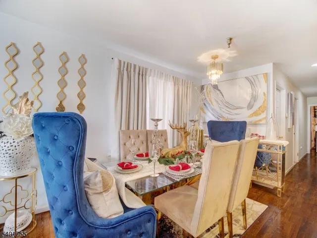 a view of livingroom with furniture and wooden floor