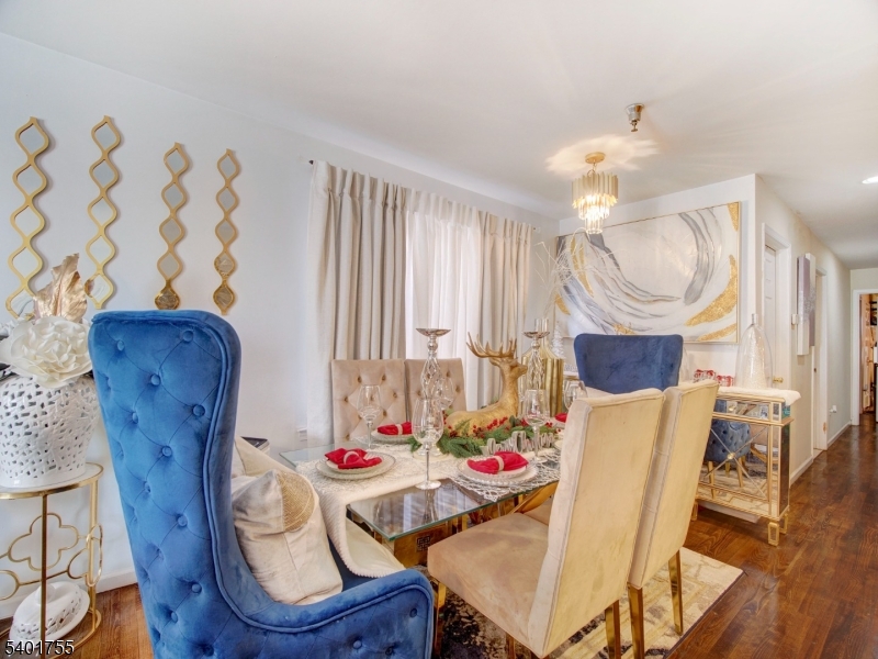 415 Loomis Street Elizabeth Port, NJ 07206 - Photo 2 of 27 a view of livingroom with furniture and wooden floor