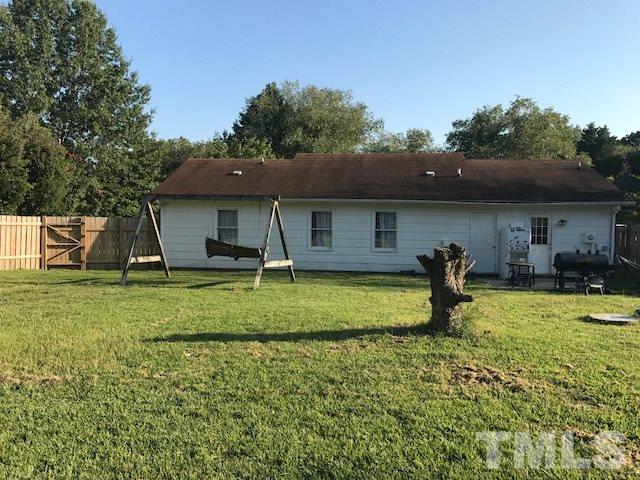 809 South Meadow Road Raleigh, NC 27603 - Photo 2 of 14 a front view of house with a garden