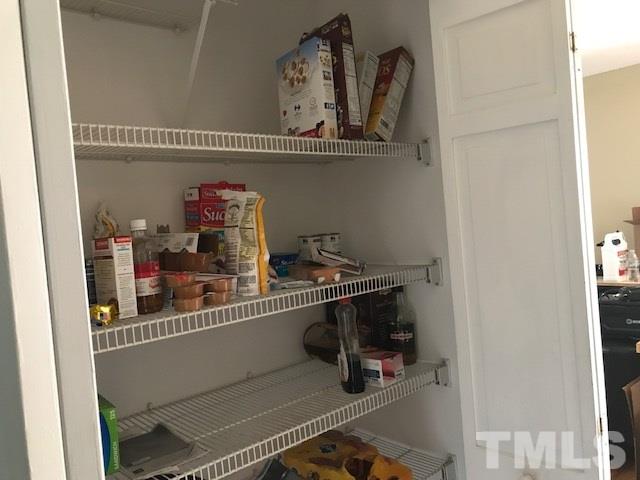 809 South Meadow Road Raleigh, NC 27603 - Photo 9 of 14 a room with storage and utility