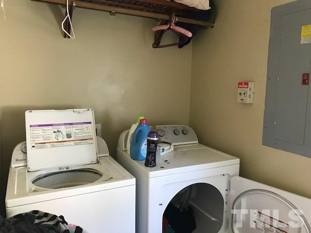 809 South Meadow Road Raleigh, NC 27603 - Photo 10 of 14 a utility room with dryer and washer