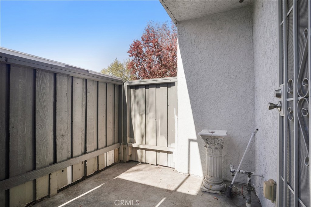 11311 Tampa Avenue, Unit 21 Porter Ranch, CA 91326 - Photo 33 of 36 a view of entryway with wooden floor