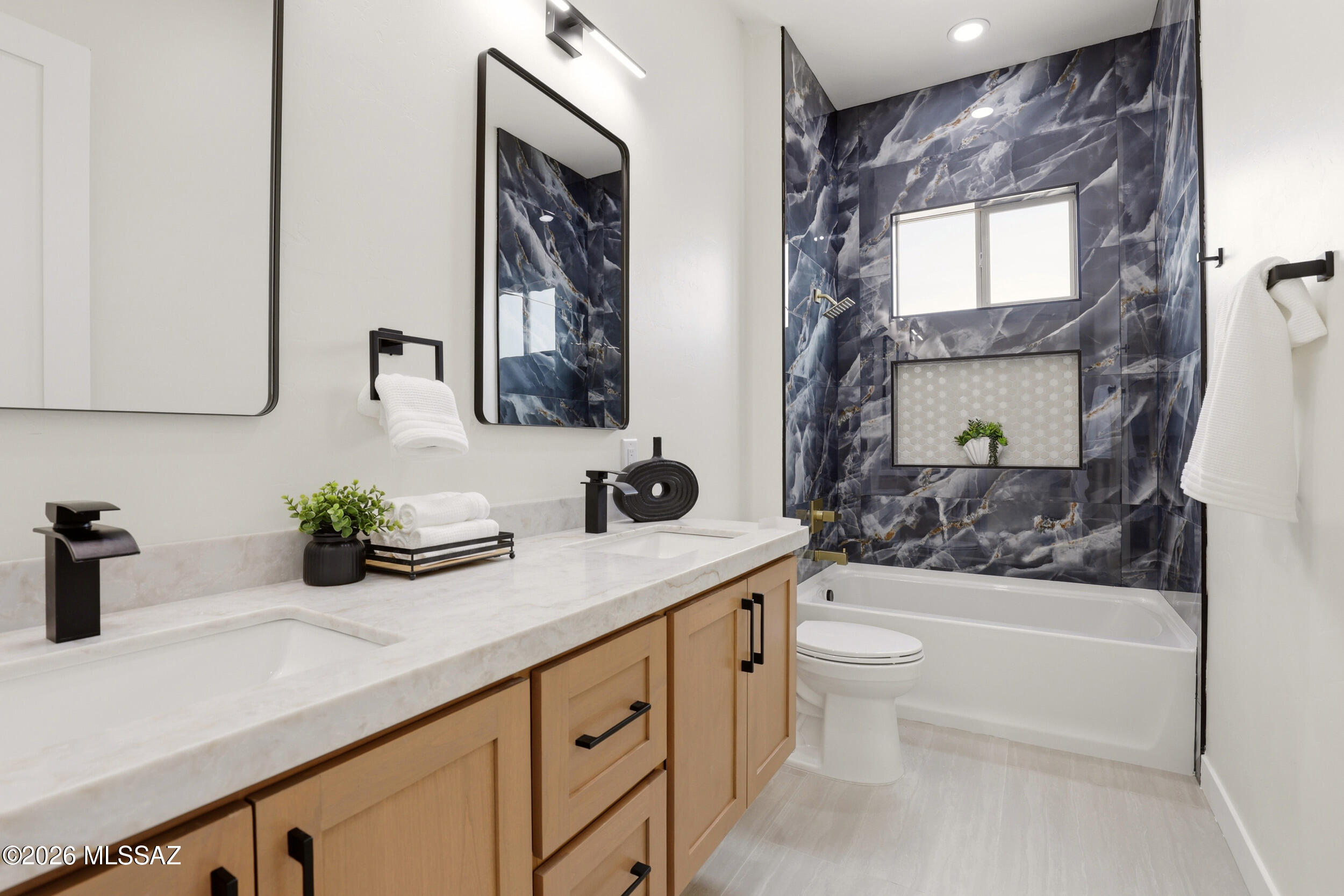 14527 East Sands Ranch Road Vail, AZ 85641 - Photo 36 of 48 a bathroom with a sink a toilet and shower