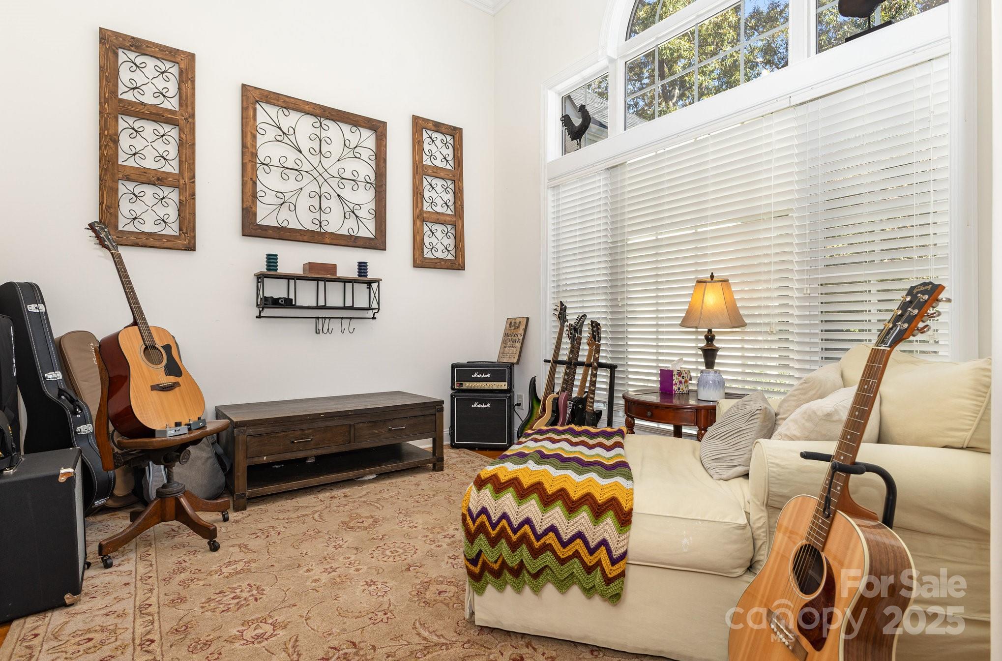 324 Old Hardin Road Dallas, NC 28034 - Photo 2 of 35 a bedroom with furniture and a window