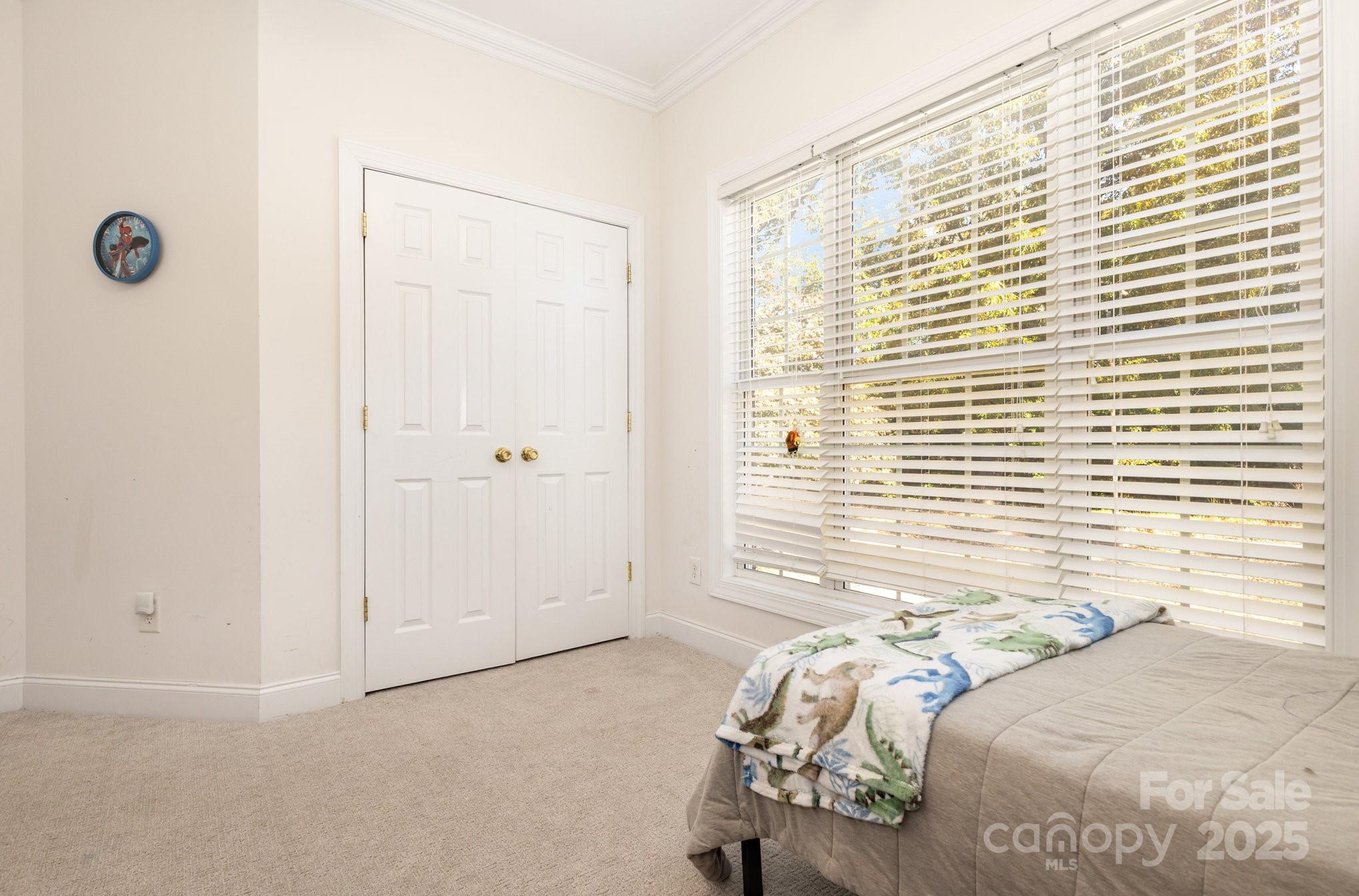 324 Old Hardin Road Dallas, NC 28034 - Photo 22 of 35 a bedroom with a bed and a window