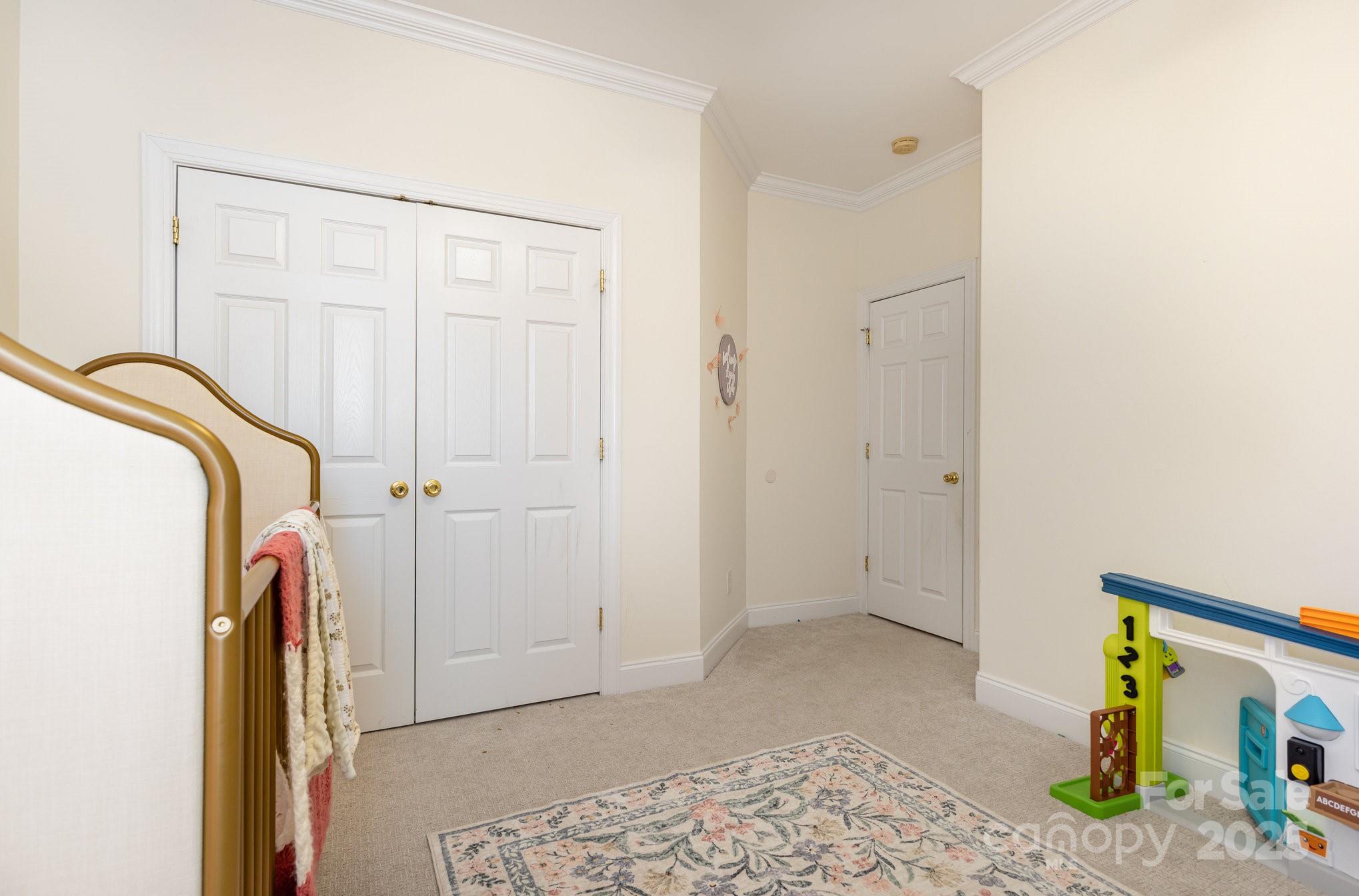 324 Old Hardin Road Dallas, NC 28034 - Photo 26 of 35 a view of walk in closet with clothes and shoes