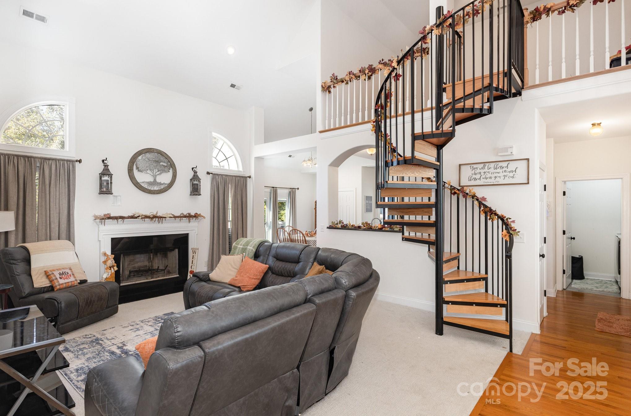 324 Old Hardin Road Dallas, NC 28034 - Photo 3 of 35 a living room with furniture and a fireplace