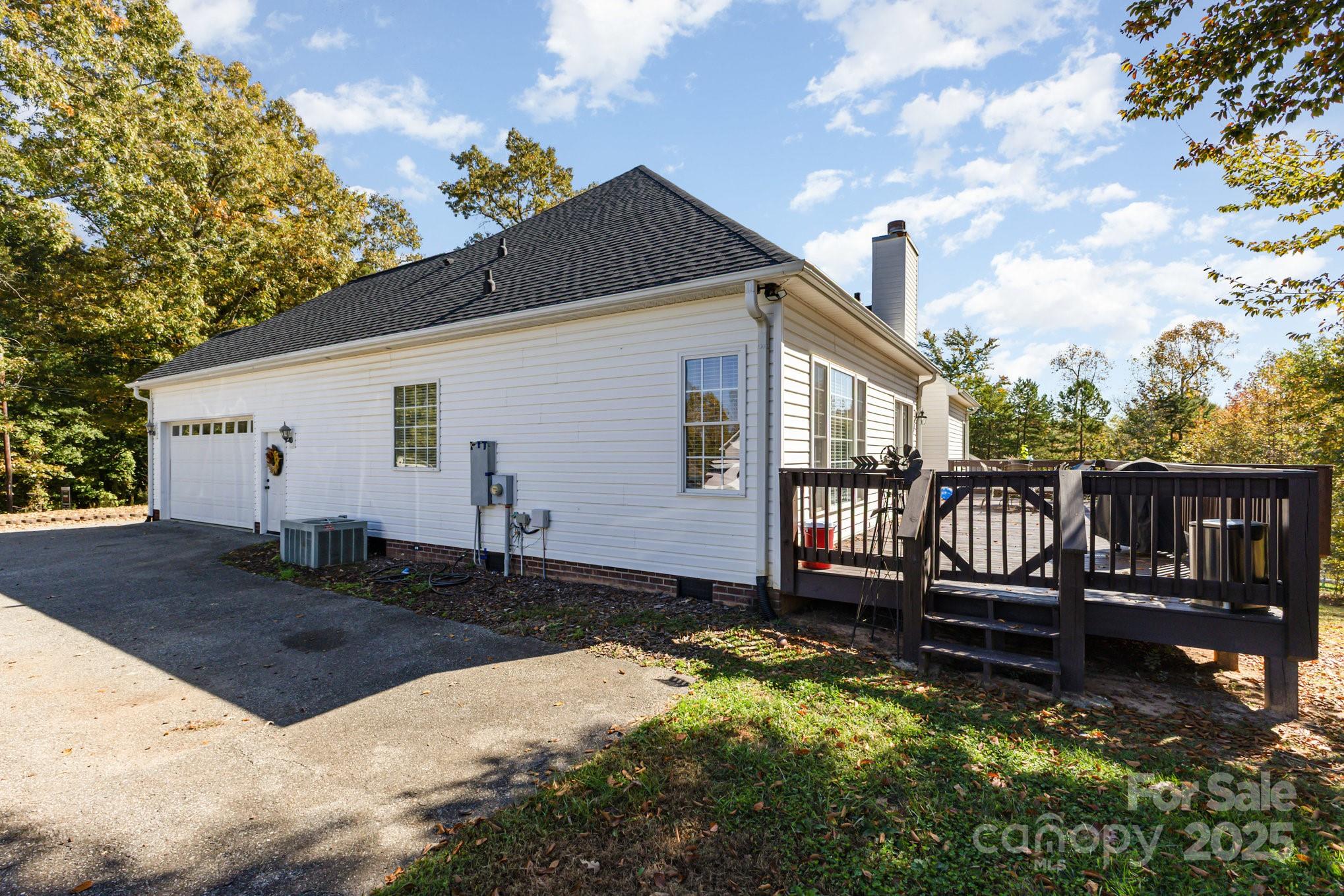 324 Old Hardin Road Dallas, NC 28034 - Photo 31 of 35 a house view with a garden space