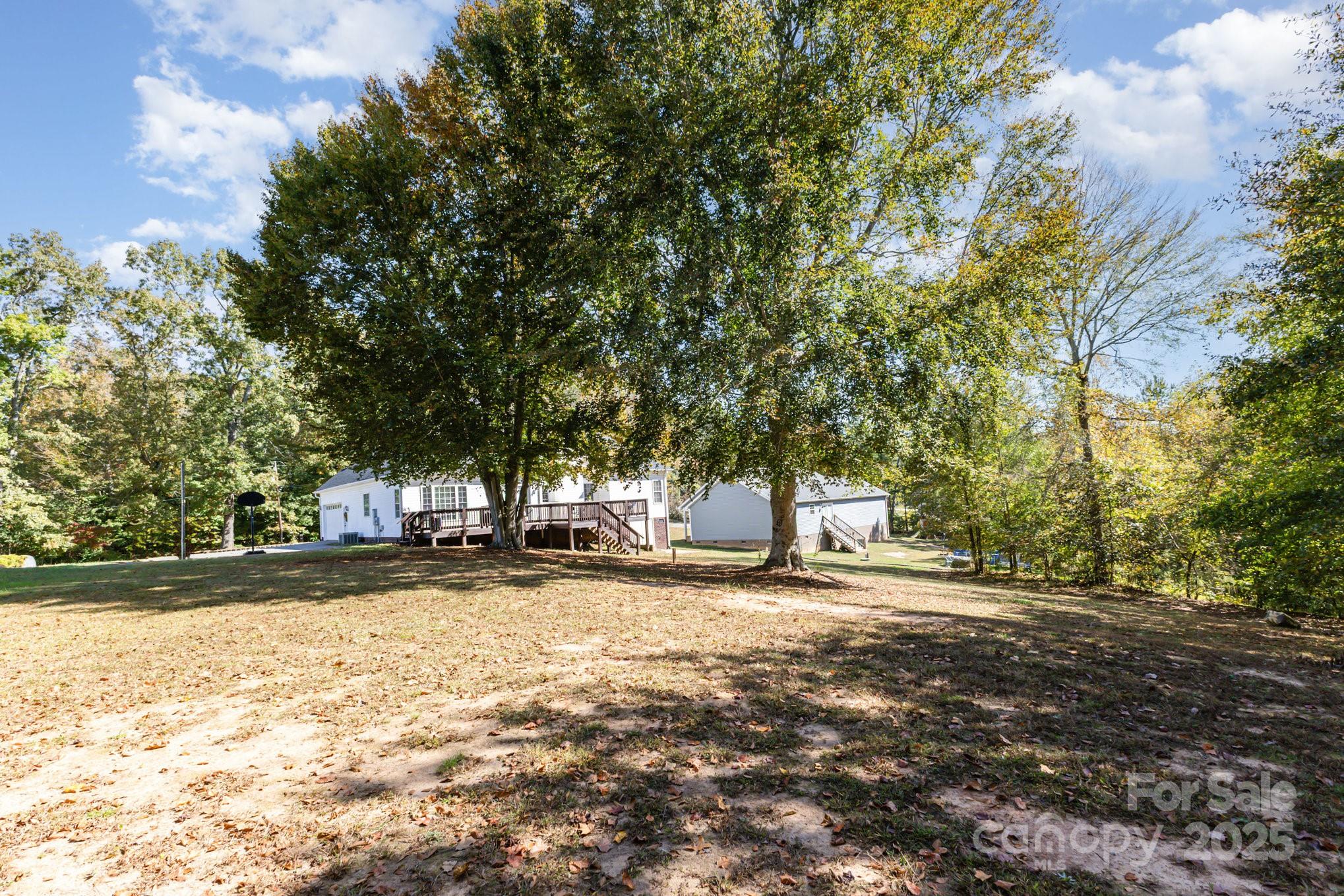 324 Old Hardin Road Dallas, NC 28034 - Photo 35 of 35 a view of a yard with a tree