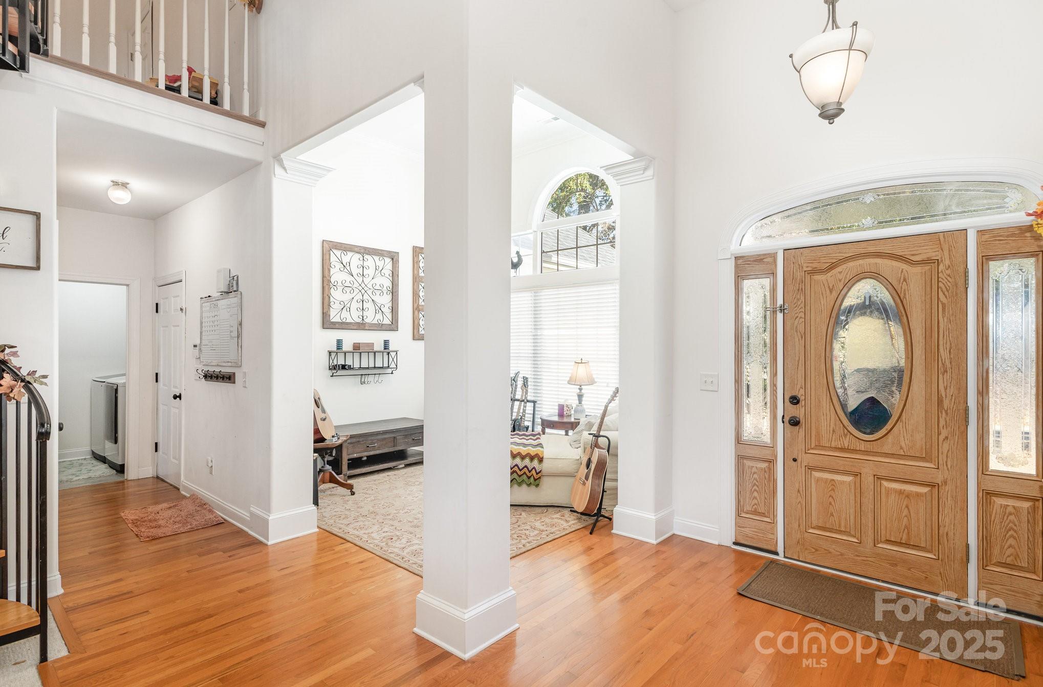 324 Old Hardin Road Dallas, NC 28034 - Photo 6 of 35 a view of a hallway with bathroom and wooden floor