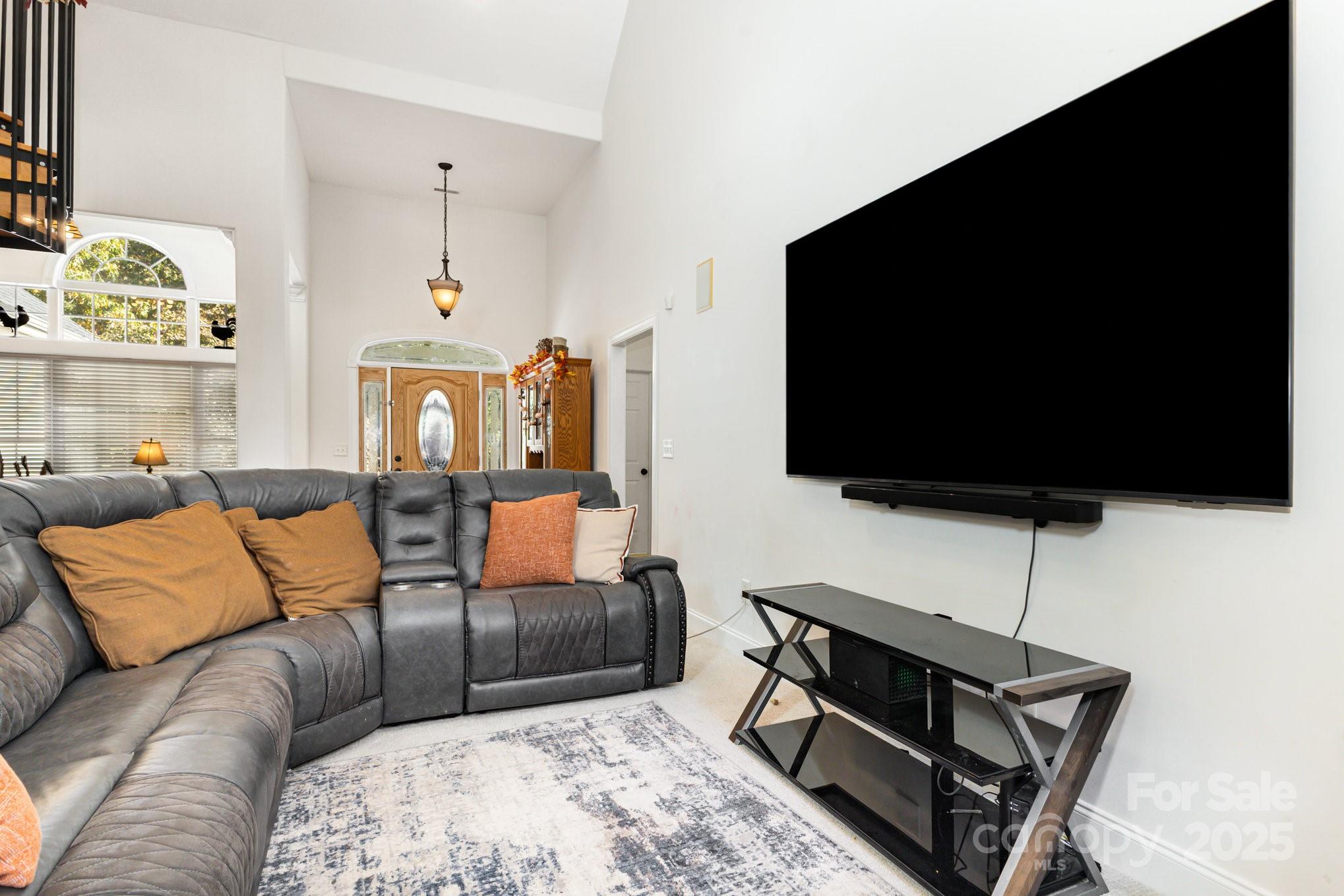 324 Old Hardin Road Dallas, NC 28034 - Photo 8 of 35 a living room with furniture and a flat screen tv