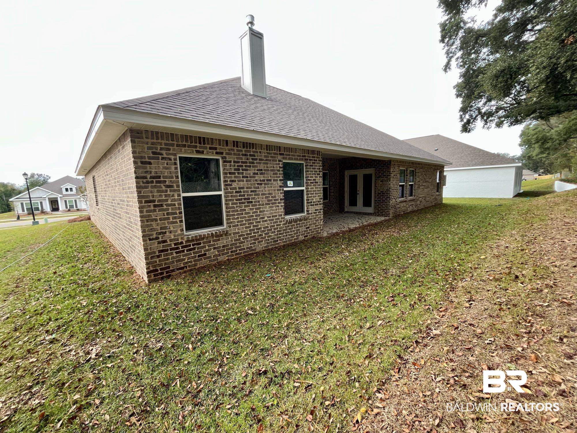 334 Barndling Street Fairhope, AL 36532 - Photo 32 of 34 Back of property with a yard