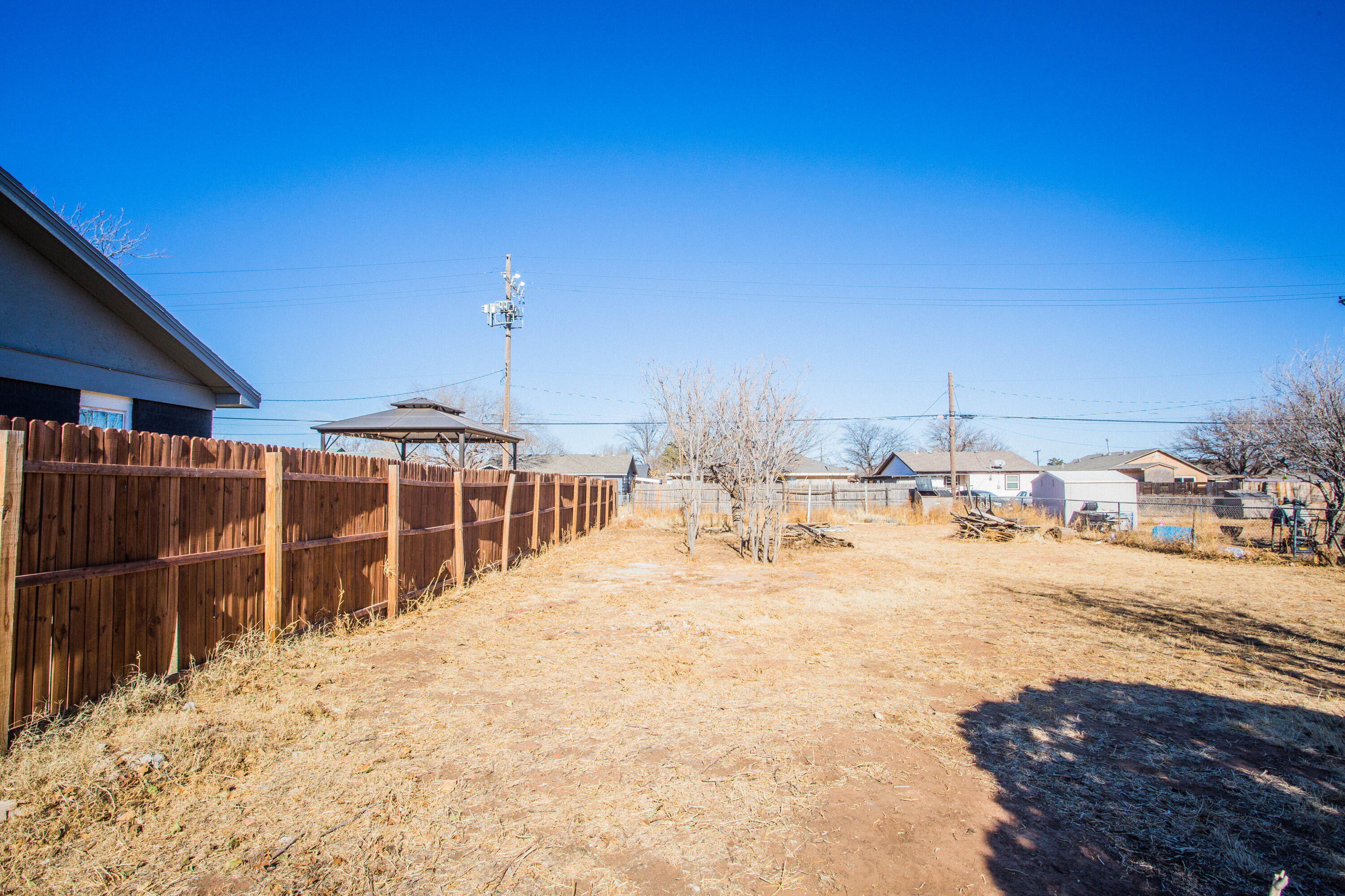2808 Amherst Street Lubbock, TX 79415 - Photo 14 of 26 a view of a house with a yard