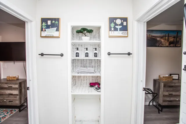 a view of kitchen with cabinets