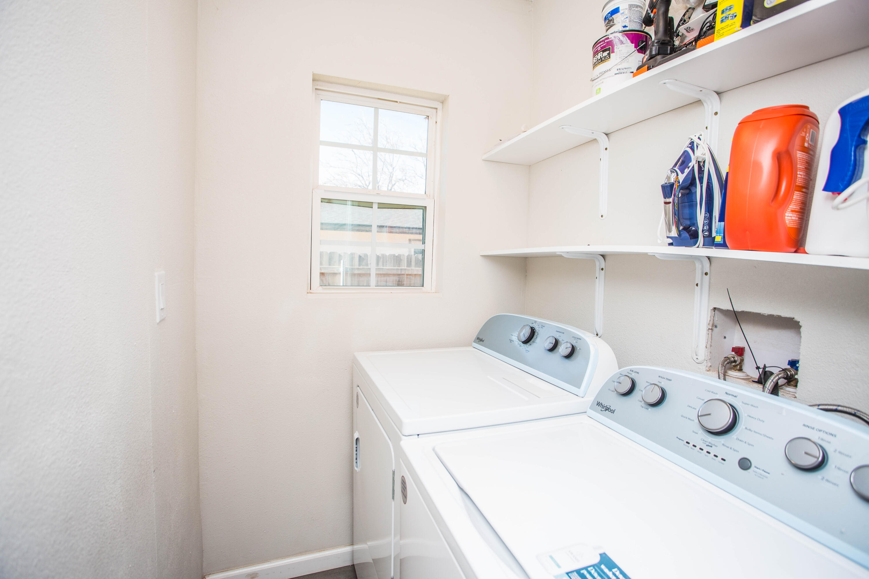 2808 Amherst Street Lubbock, TX 79415 - Photo 22 of 26 a utility room with dryer and washer