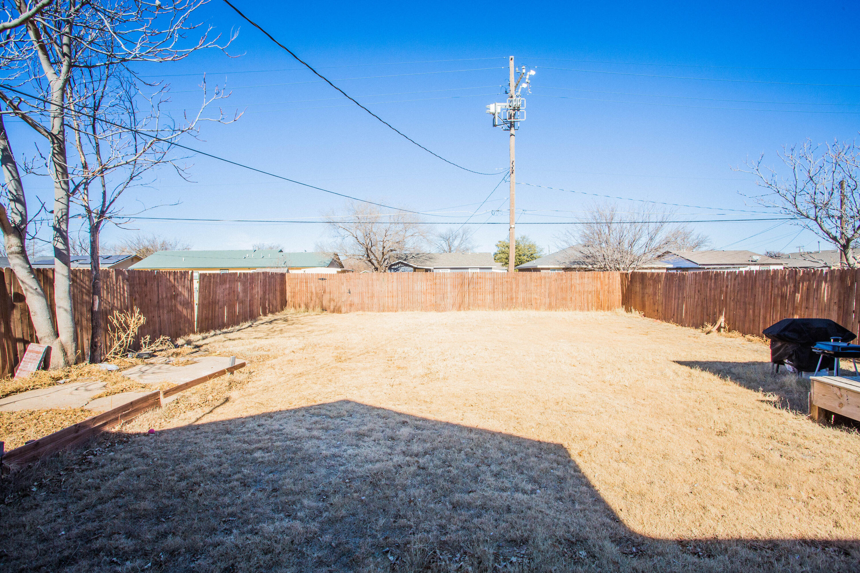 2808 Amherst Street Lubbock, TX 79415 - Photo 23 of 26 a view of a backyard of a house