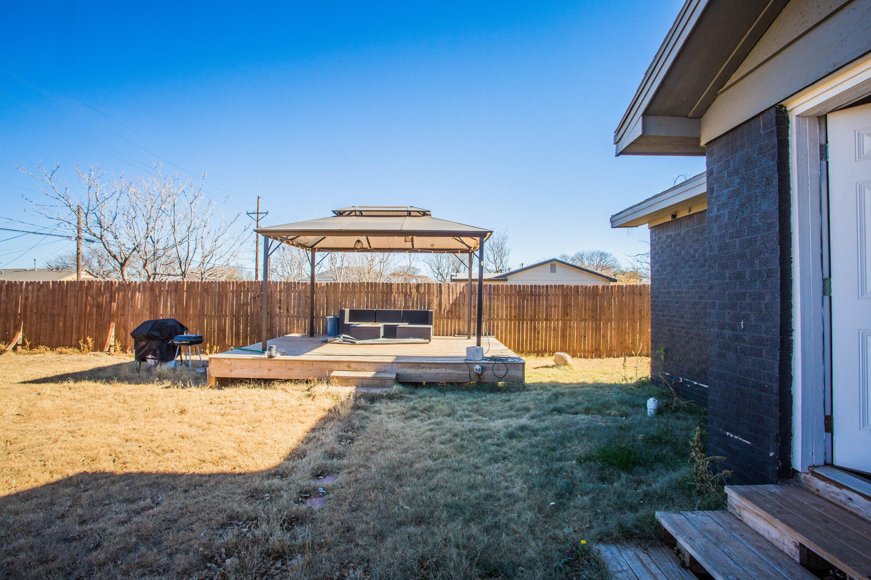 2808 Amherst Street Lubbock, TX 79415 - Photo 24 of 26 a view of a house with backyard and sitting area