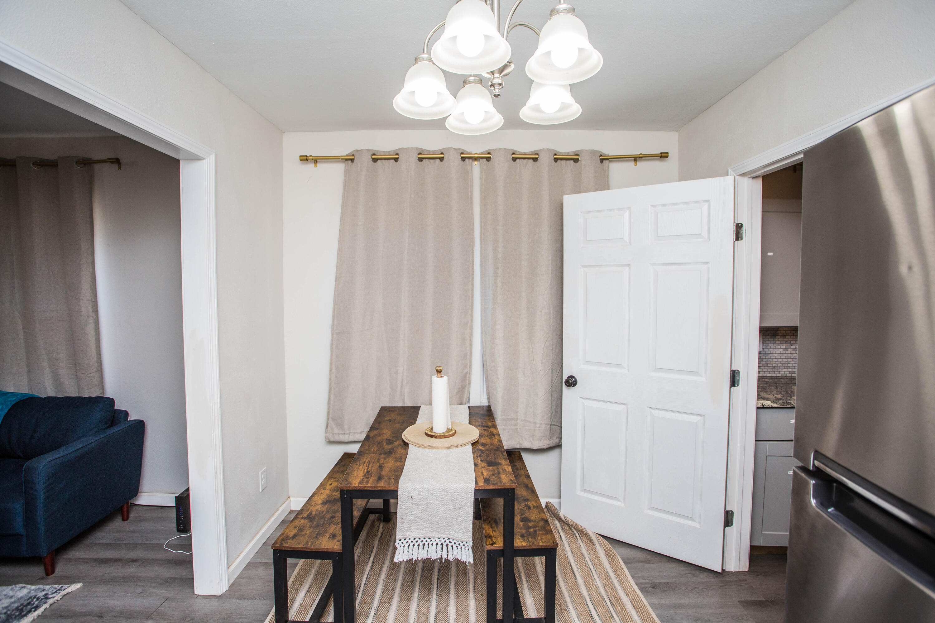 2808 Amherst Street Lubbock, TX 79415 - Photo 6 of 26 a view of a livingroom with a furniture wooden floor and a ceiling fan